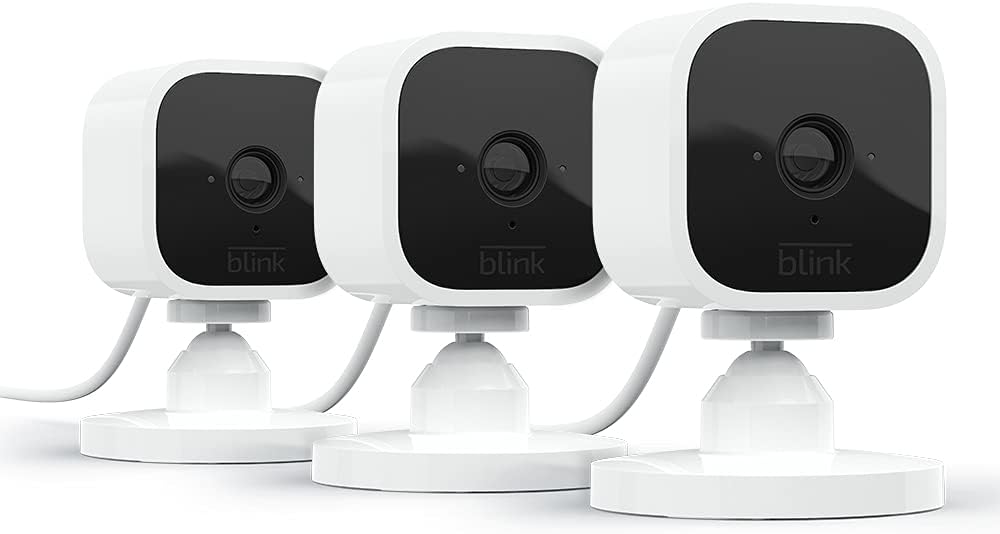 Blink Mini - Compact indoor plug-in smart security camera, 1080p HD video, night vision, motion detection, two-way audio, easy set up, Works with Alexa – 2 cameras (White)