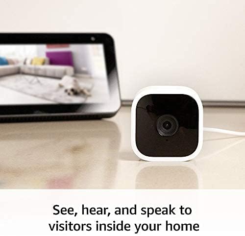 Blink Mini - Compact indoor plug-in smart security camera, 1080p HD video, night vision, motion detection, two-way audio, easy set up, Works with Alexa – 2 cameras (White)