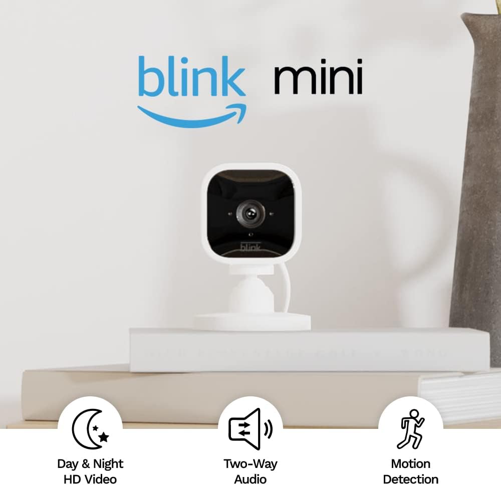 Blink Mini - Compact indoor plug-in smart security camera, 1080p HD video, night vision, motion detection, two-way audio, easy set up, Works with Alexa – 2 cameras (White)