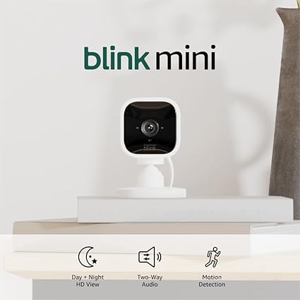 Blink Mini - Compact indoor plug-in smart security camera, 1080p HD video, night vision, motion detection, two-way audio, easy set up, Works with Alexa – 2 cameras (White)