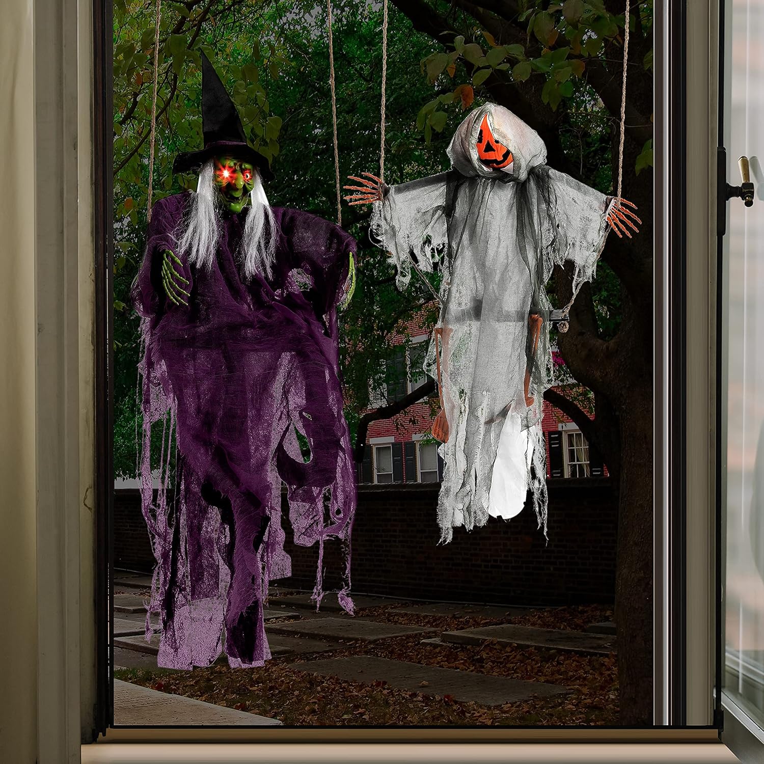 JOYIN 2 Pcs Halloween Hanging Swinging Ghosts Decorations Outdoor, Halloween Scary Decor with Lighted Up Eyes, Creepy Swinging Skeleton Flying Props for Yard Patio Lawn Garden